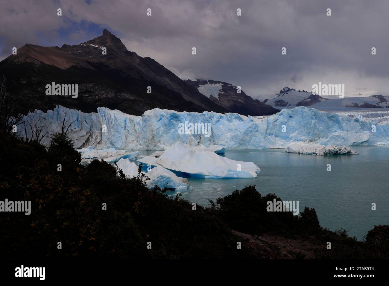 Perito Moreno Glacier with icebergs in Lago Argentino Lake in Los Glaciares National Park near El Calafate.Argentina Stock Photo