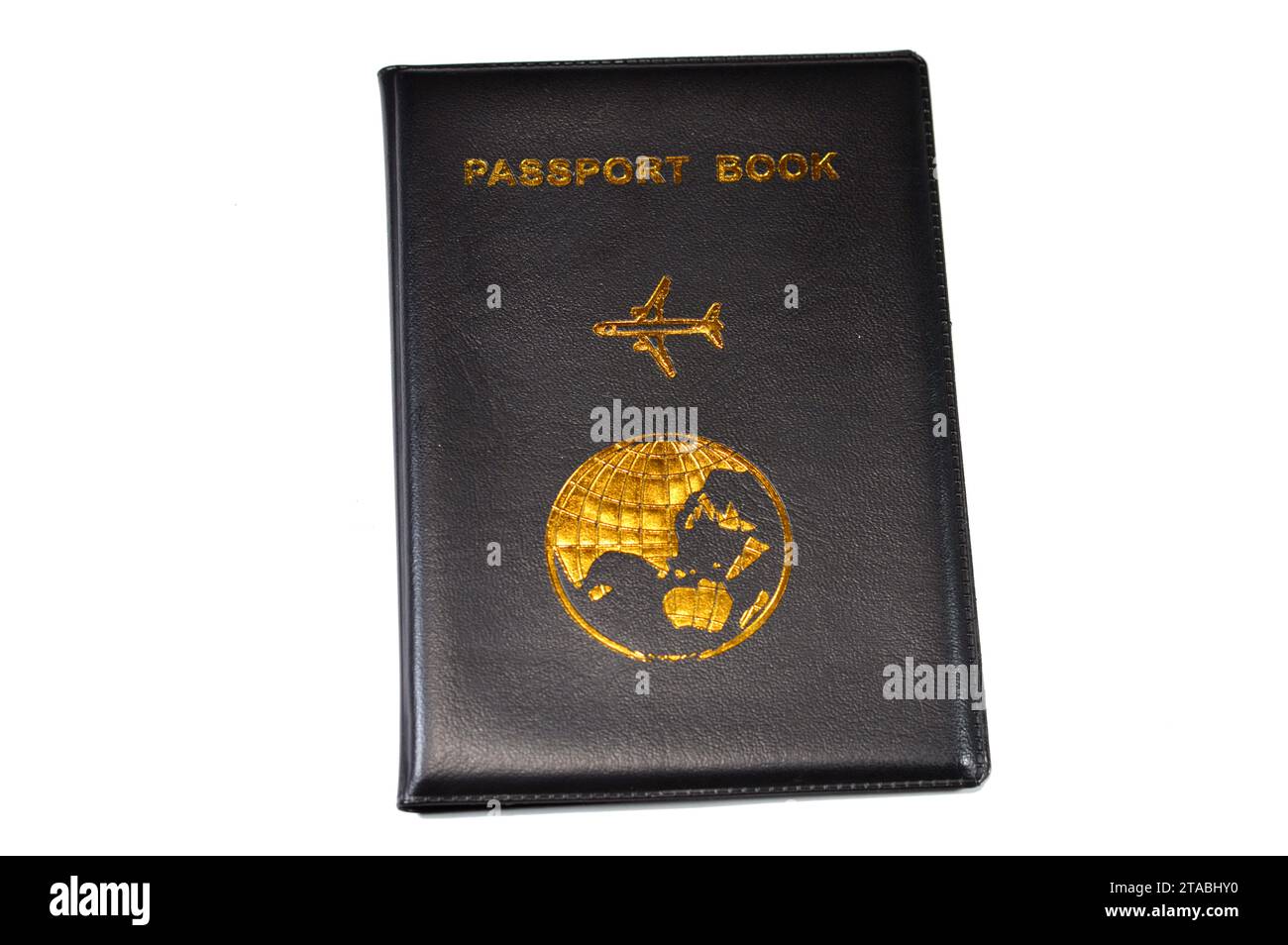 Black passport book with a plane and the globe earth on its cover