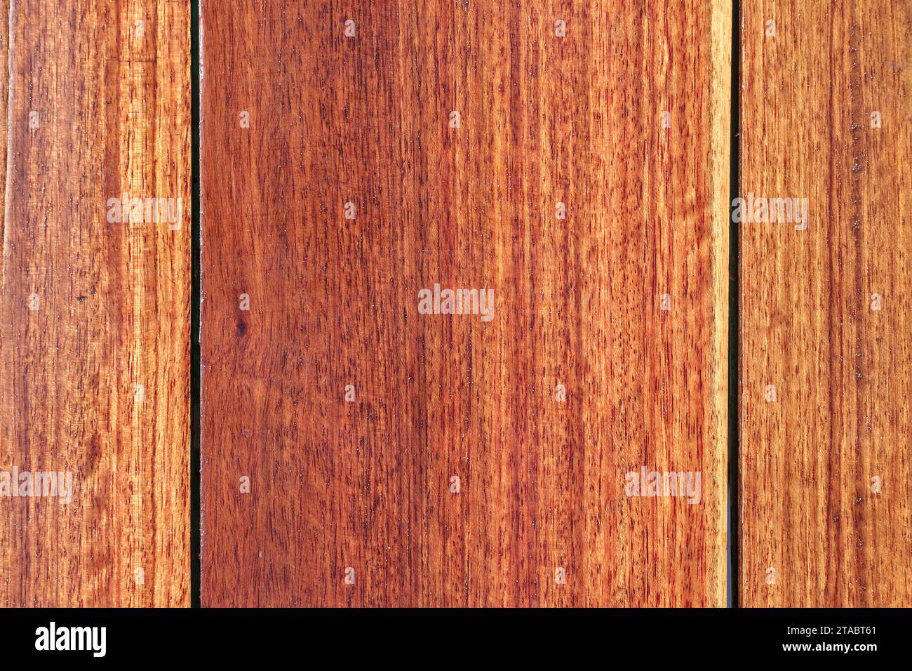 Top view of a varnished plank floor and seeing the connections of the boards. Stock Photo