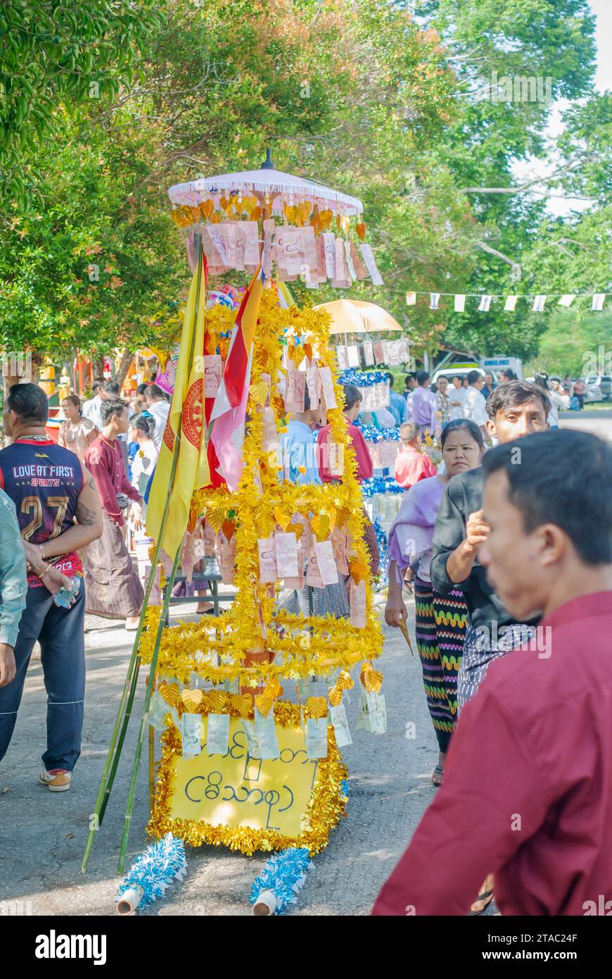 SURATTANI, THAILAND- NOV. 06, 2023: Burmese people dress in national clothes, Came out happily during the Kathin merit-making festival of our Burmese Stock Photo