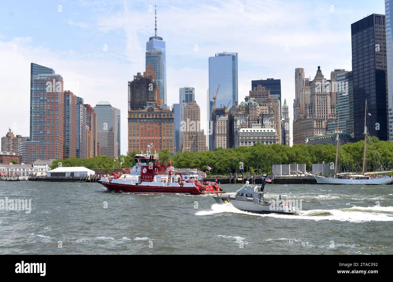 New York, USA - June 9, 2018: Fireboat of FDNY moving near the financial district in lower Manhattan, New York, USA Stock Photo