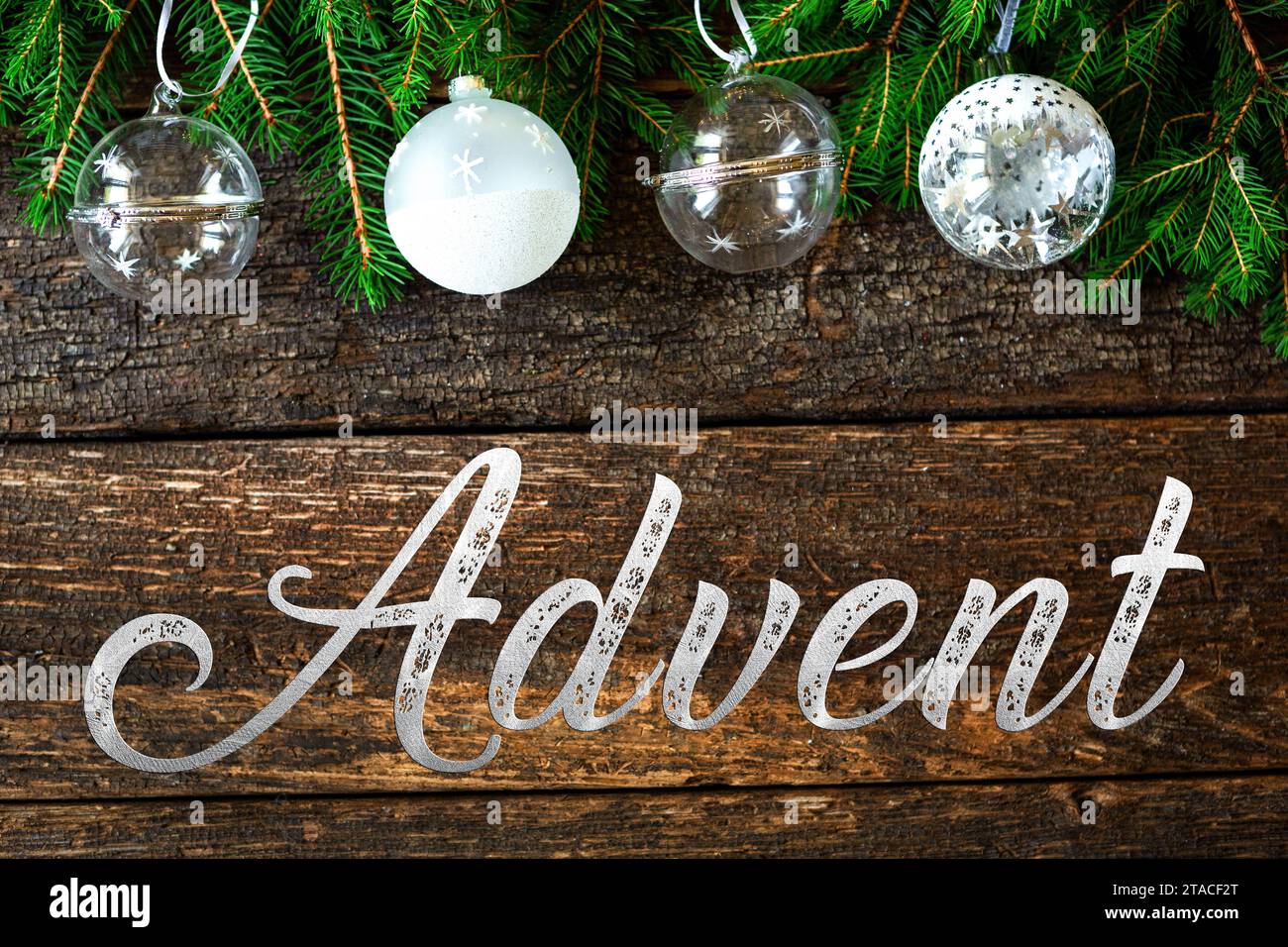 November 30, 2023: Advent lettering on a rustic wooden surface with Christmas decoration FOTOMONTAGE *** Advent Schriftzug auf einer rustikalen Holzfläche mit Weihnachtsdekoration FOTOMONTAGE Stock Photo