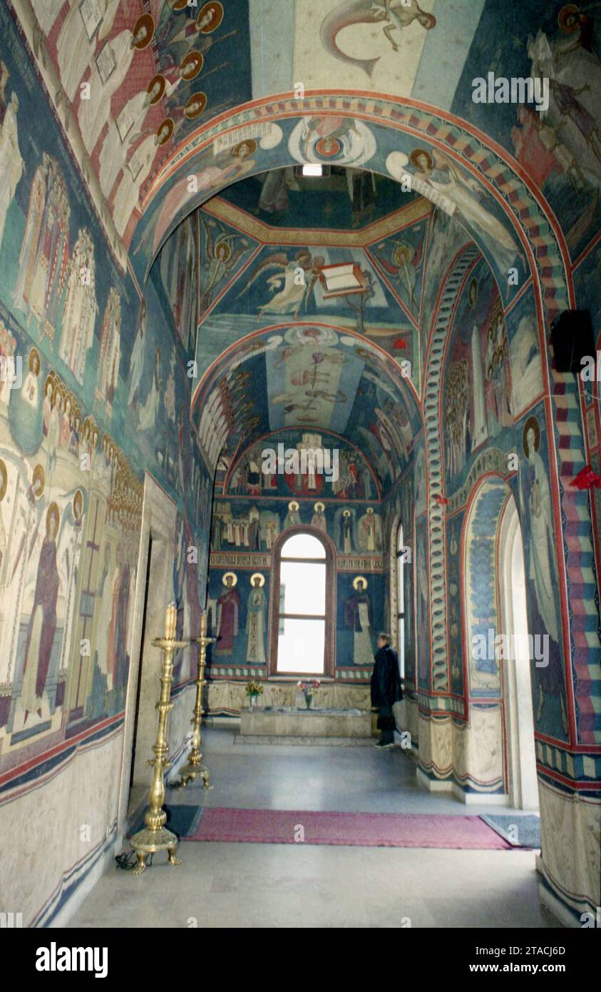Gorj County, Romania, 2001. The veranda of the 'Dormition of the Mother of God' church at Tismana Monastery, a historical monument from the 14th century. Stock Photo
