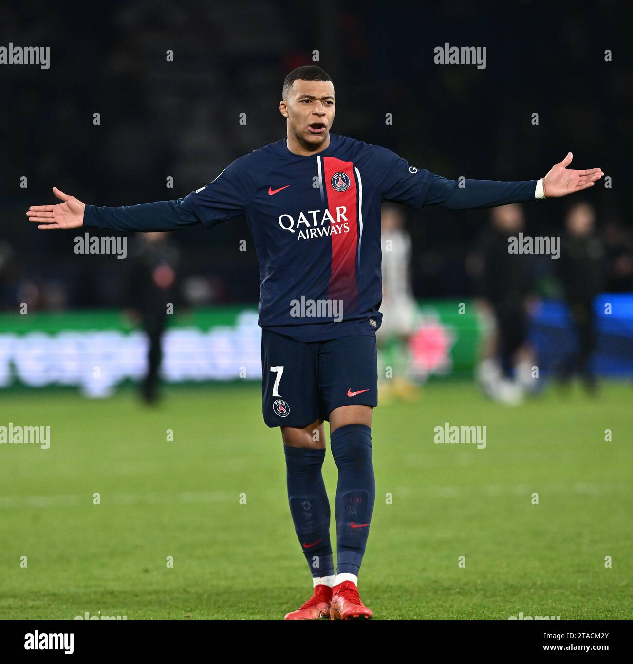 PARIS, FRANCE - NOVEMBER 28: Kylian Mbappe of PSG open arms gesture during the UEFA Champions League match between Paris Saint-Germain and Newcastle U Stock Photo