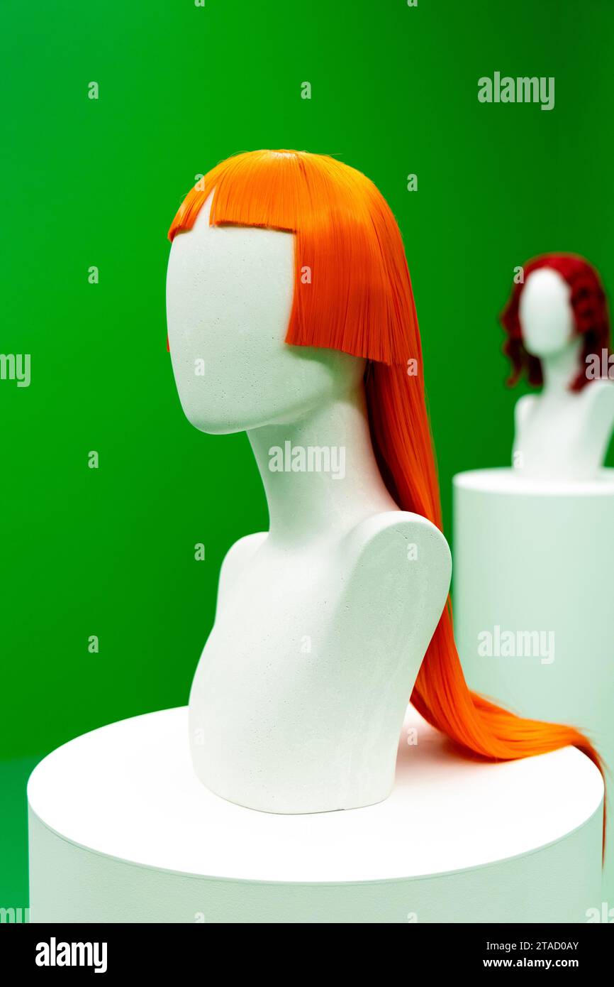 Colourful wigs at the Sin Wai Kin 'Portraits' exhibition (2023) at Soft Opening gallery, London, England Stock Photo