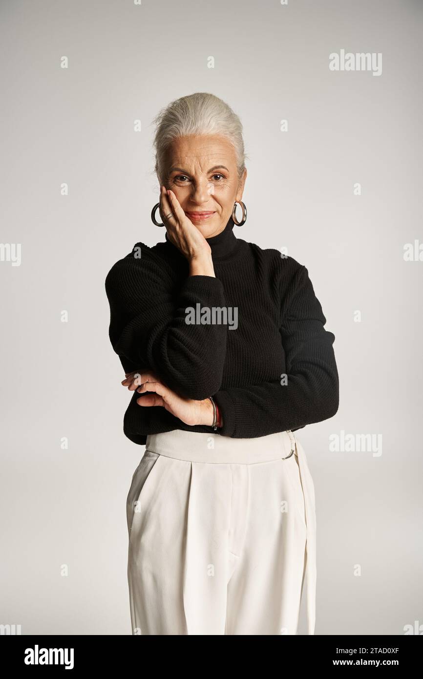 Hoop earrings and mature woman hi-res stock photography and images - Alamy