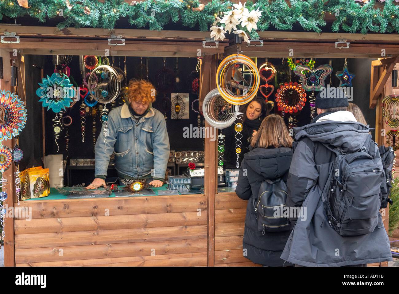 Christmas market stall selling seasonal decorations in Leicester Square
