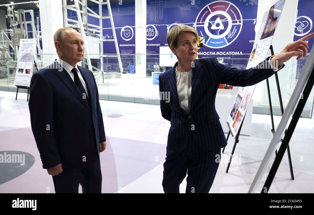 Sochi, Russia. 29th Nov, 2023. Russian President Vladimir Putin, left, accompanied by the head of the Talent and Success Educational Foundation, Yelena Shmelyova, right, is shown a display of robotics at the Breakthrough-Sirius robotics training and experimental centre, November 29, 2023 in Sochi, Russia. Credit: Mikhail Klimentyev/Kremlin Pool/Alamy Live News Stock Photo