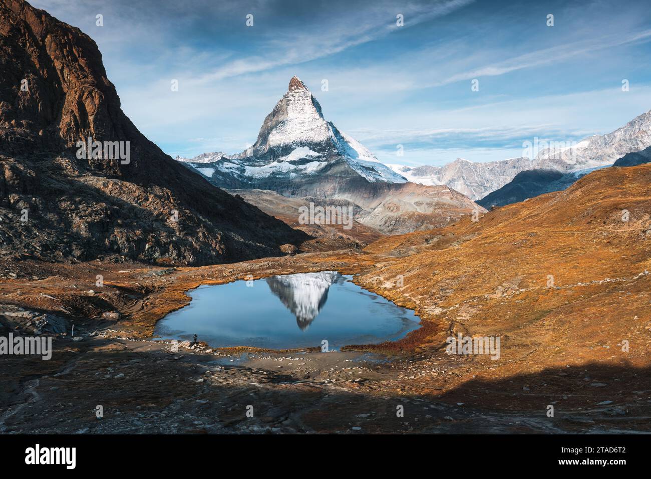 Beautiful landscape of Riffelsee lake and Matterhorn iconic mountain reflection in the morning at canton of Valais, Switzerland Stock Photo