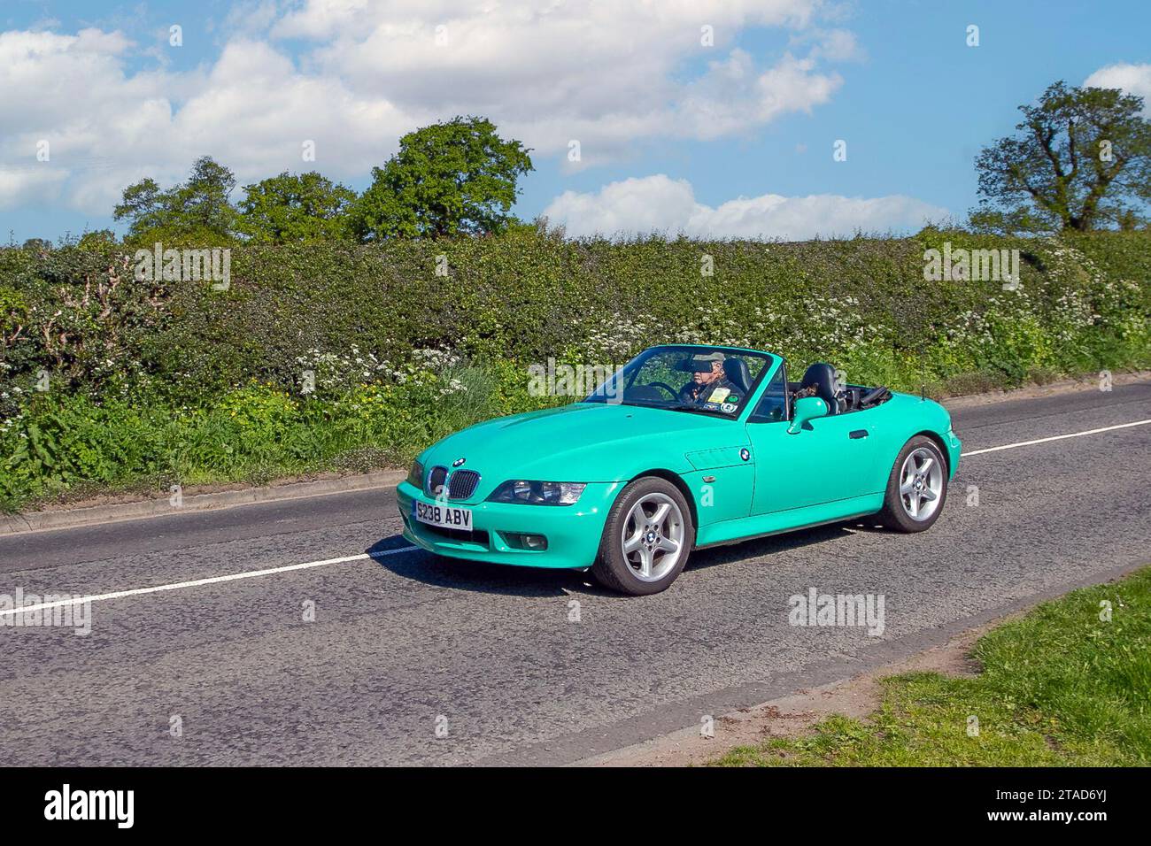 1999 90s nineties Fiji Green BMW Z3 316i SE,  roadster, 4 speed manual 1895 cc petrol 2dr cabrio, 4 speed automatic with five-spoke alloy wheels;  Vintage, restored classic motors, automobile collectors motoring enthusiasts, historic veteran cars travelling in Cheshire, UK Stock Photo