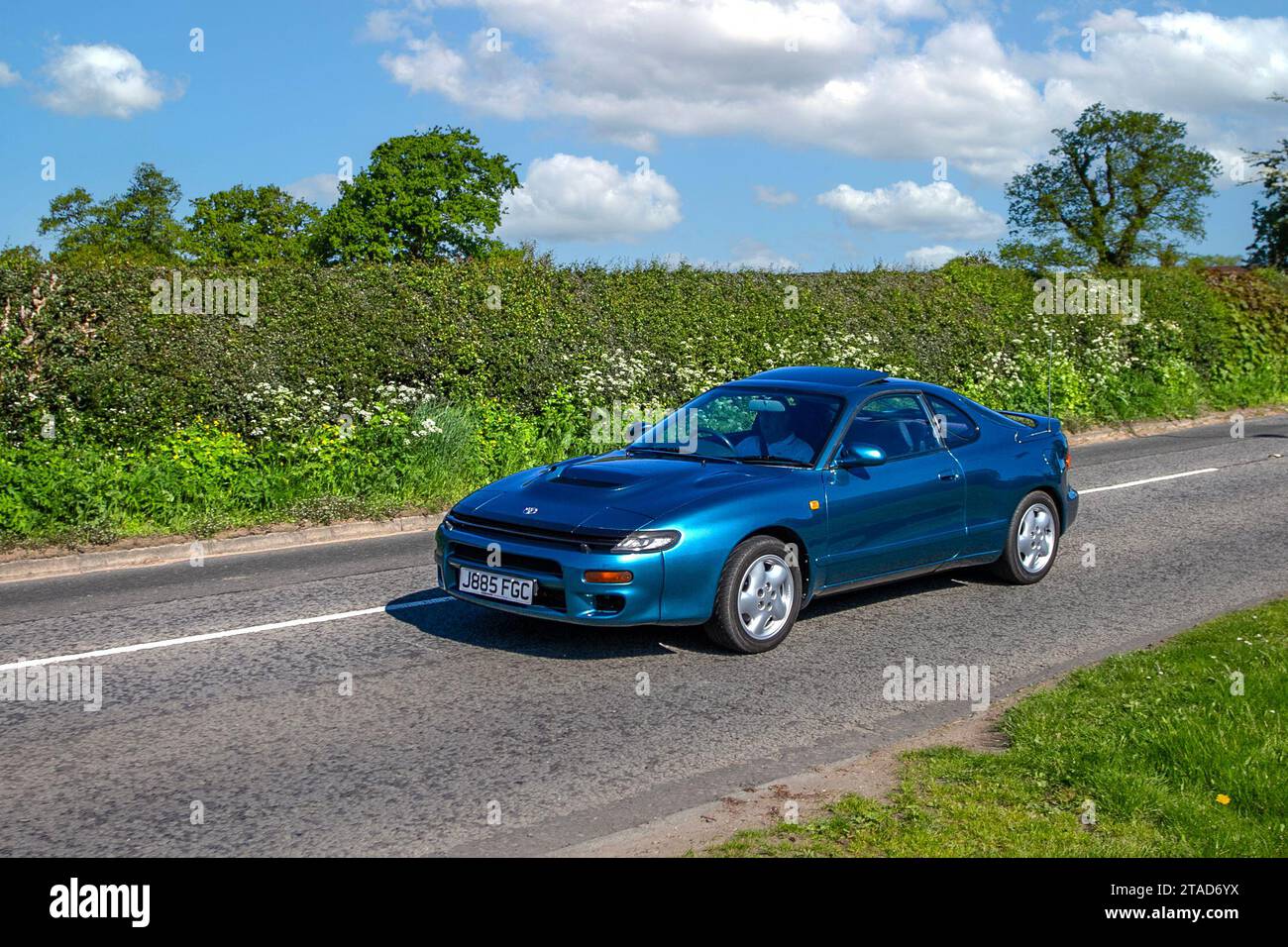 1992 90s nineties Toyota Celica T-Bar GT4 Turquoise 5 speed manual 1998 cc Petrol roadster, 1998cc, 4-cyl turbo, fun sports coupe;  Vintage, restored classic motors, automobile collectors motoring enthusiasts, historic veteran cars travelling in Cheshire, UK Stock Photo