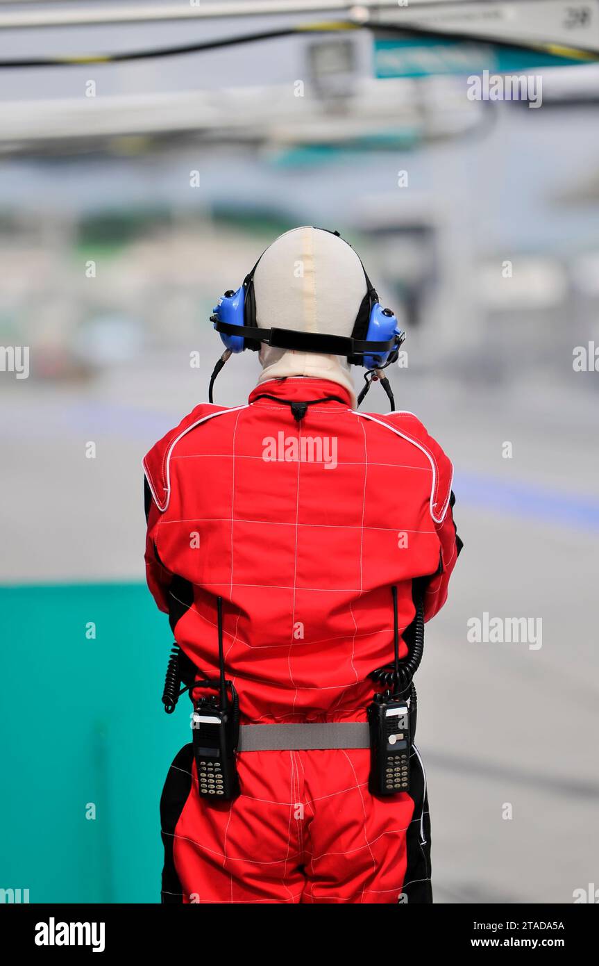 Race marshall stand guard Stock Photo Alamy