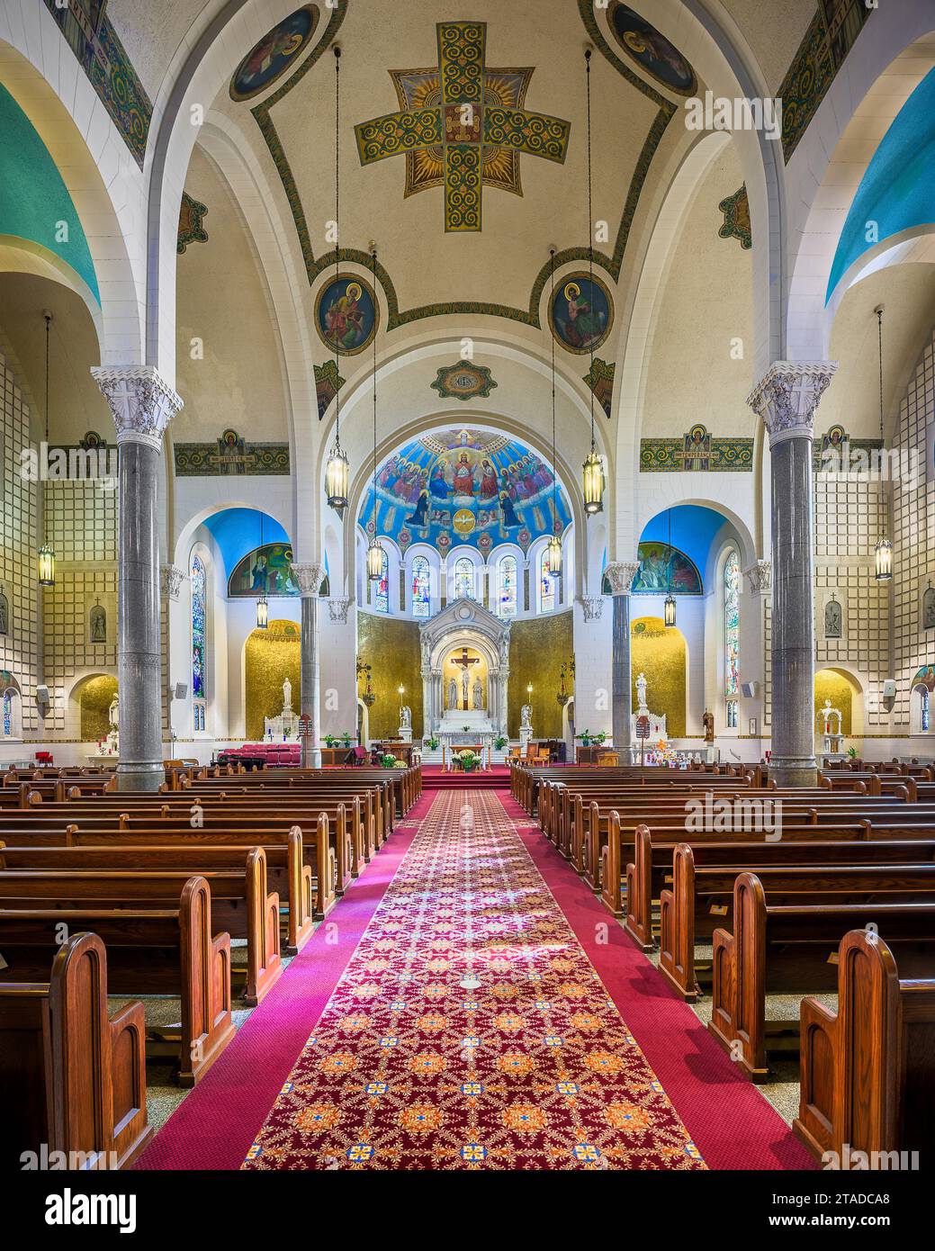 Interior nave and sanctuary of St Benedict Catholic Church in Terre Haute, Indiana Stock Photo