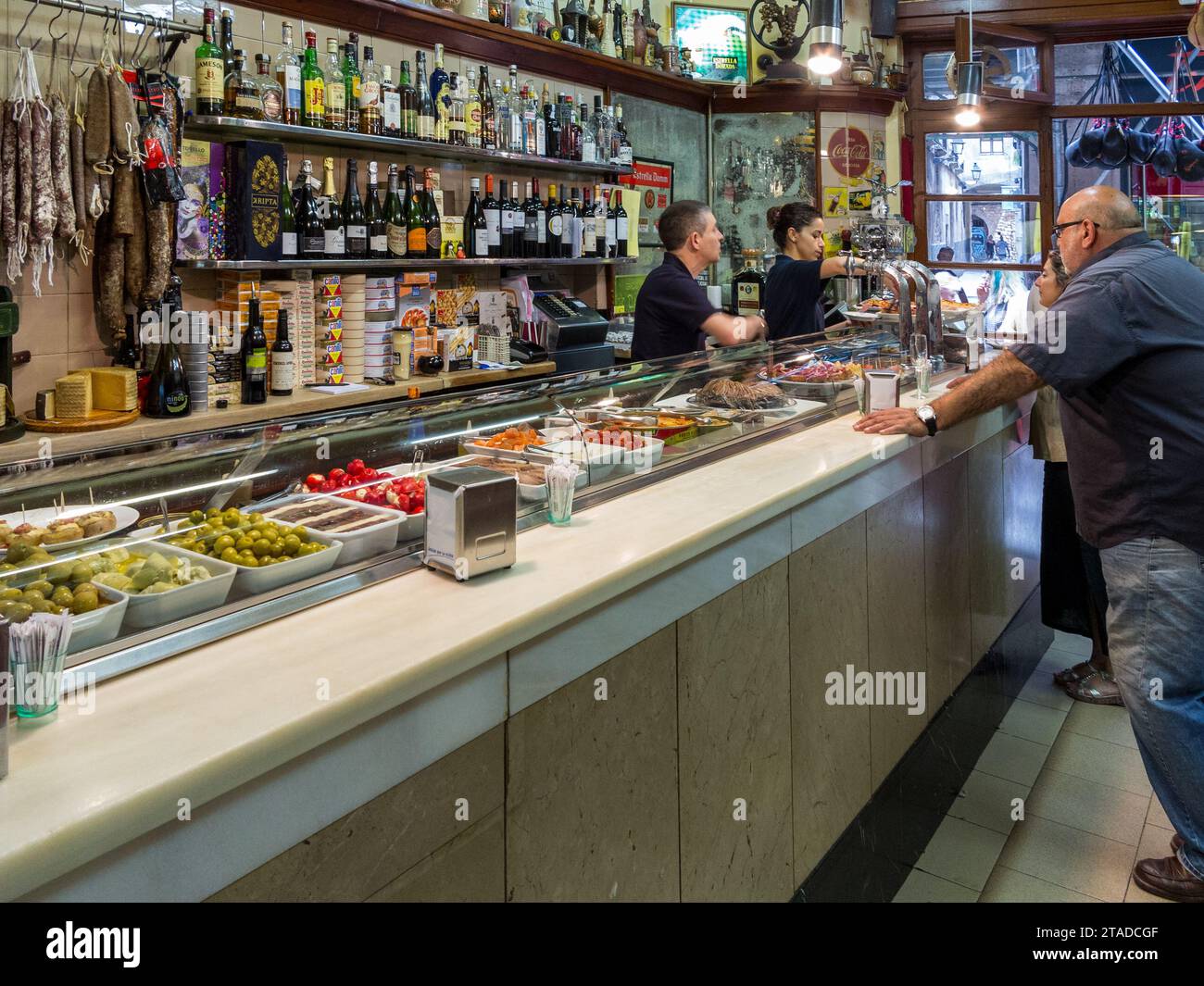 Tapas served at El Xampanyet restaurant's bar, Barcelona, Spain Stock