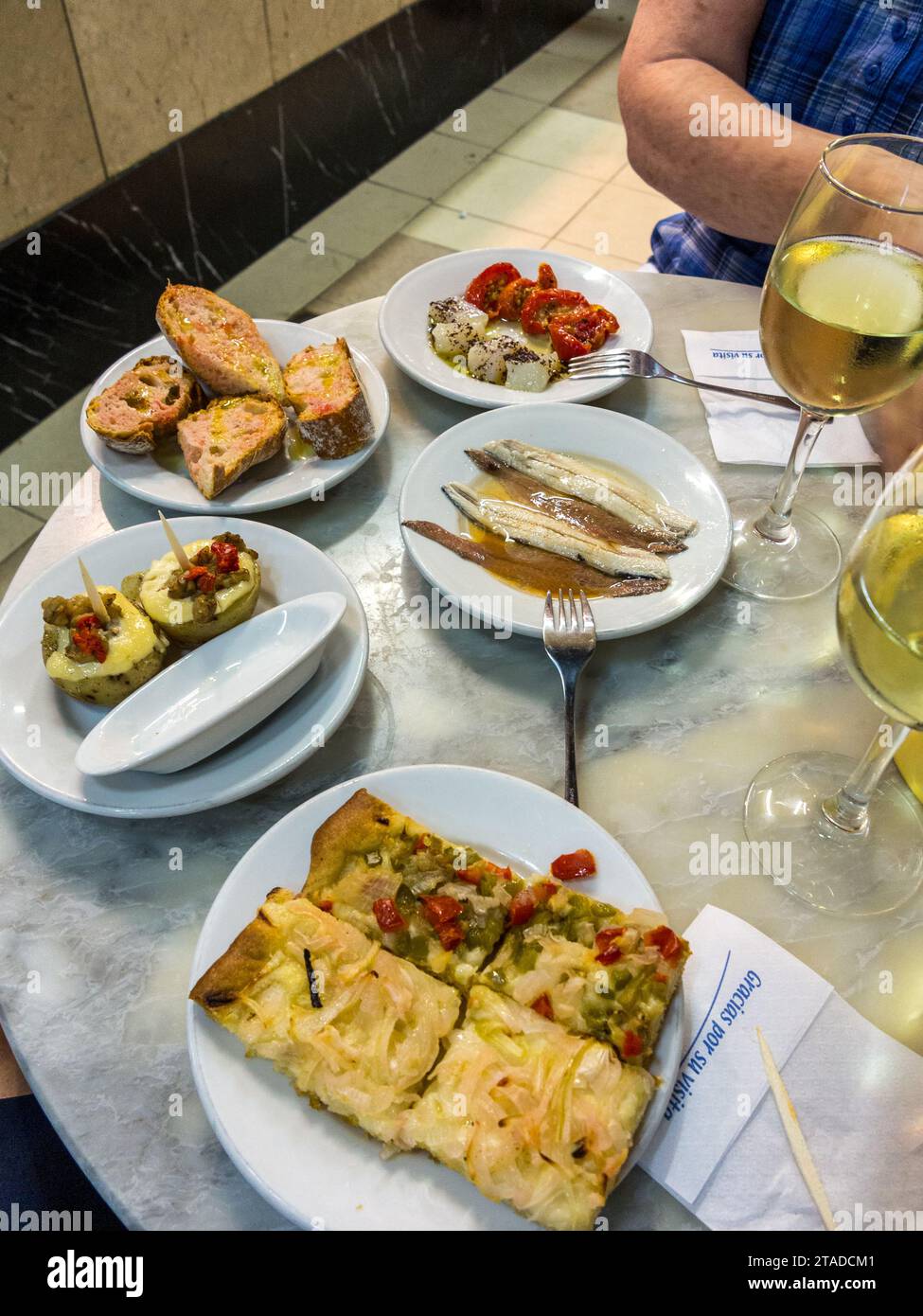 Tapas served at El Xampanyet restaurant's bar, Barcelona, Spain Stock
