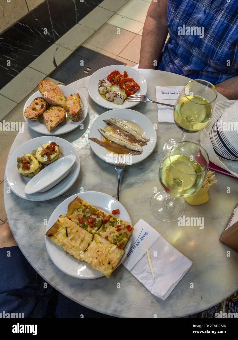 Tapas served at El Xampanyet restaurant's bar, Barcelona, Spain Stock
