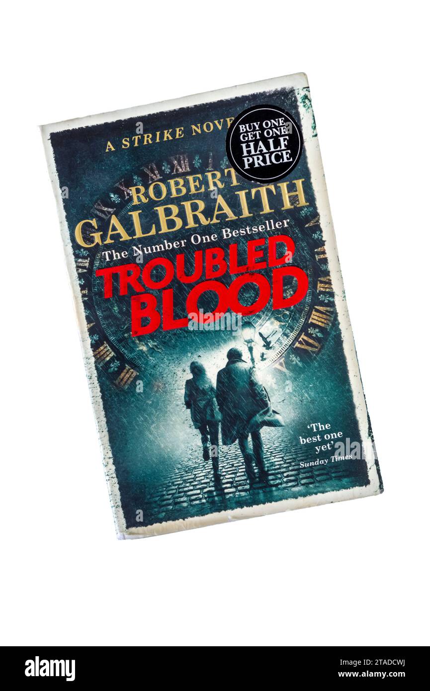 A paperback copy of Troubled Blood, a Cormoran Strike novel by JK Rowling writing as Robert Galbraith. First published in 2020. Stock Photo
