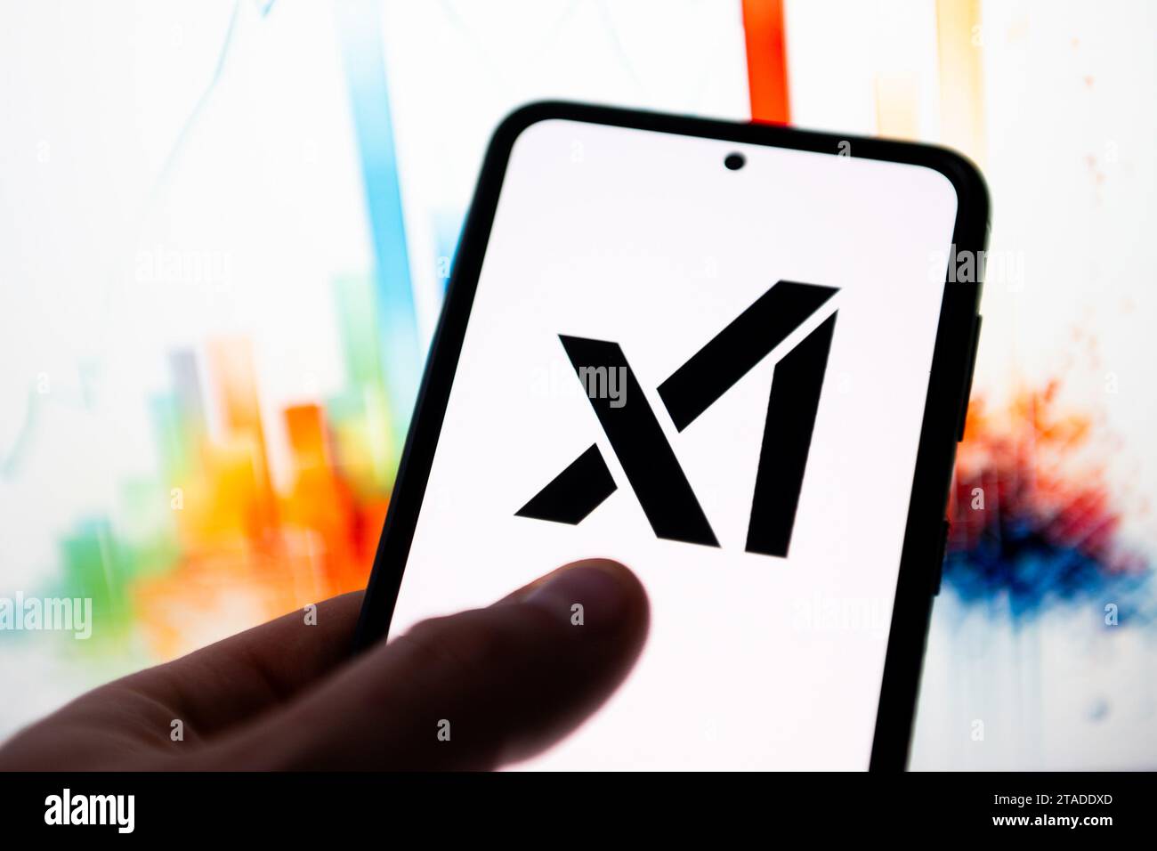 In this photo illustration a XaI Elon Musk logo seen displayed on a