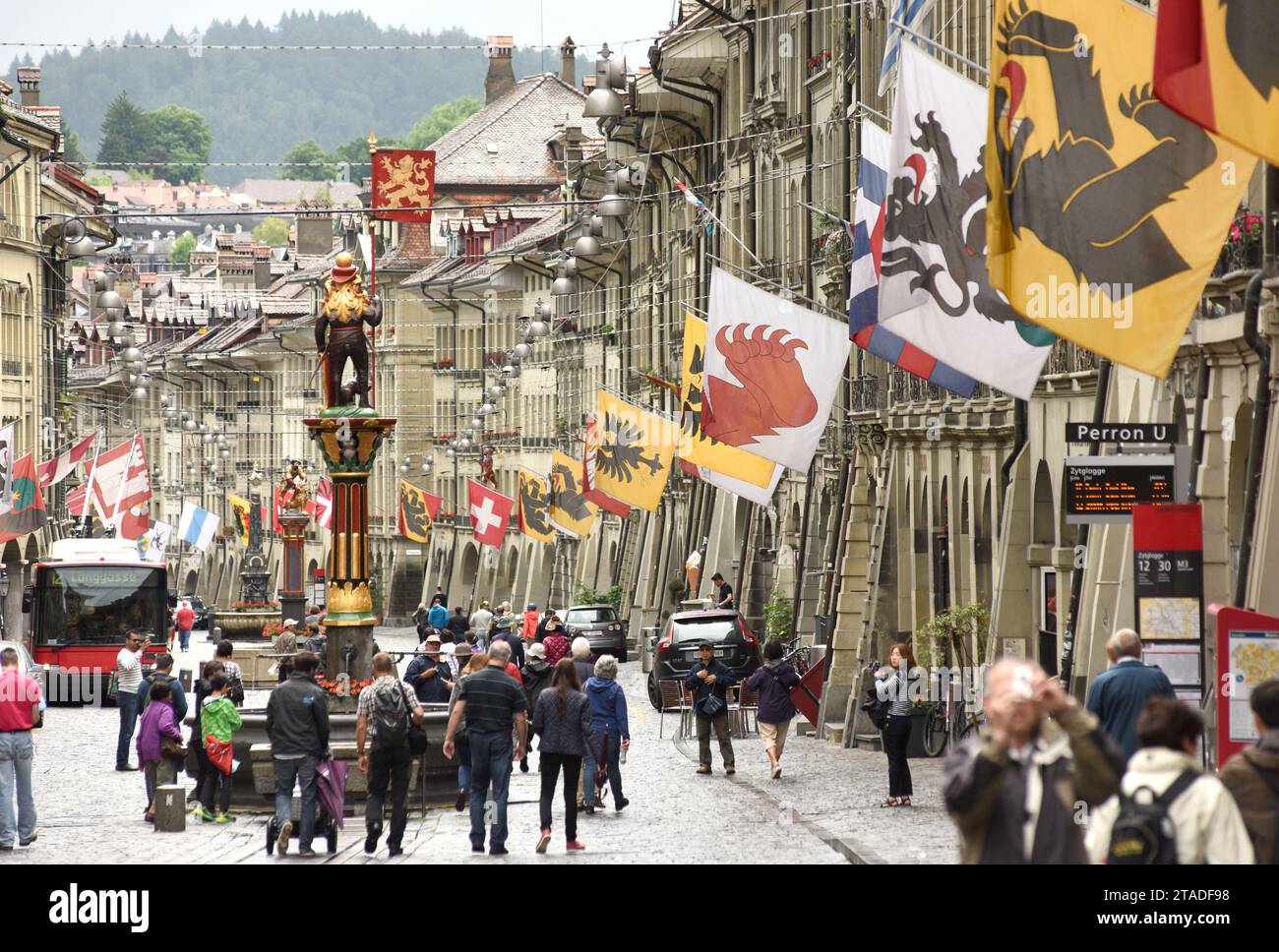 Bern, Switzerland - June 04, 2017: People in old city center of Bern. Shopping street in the old medieval city of Bern, Switzerland.er of Bern, Switze Stock Photo