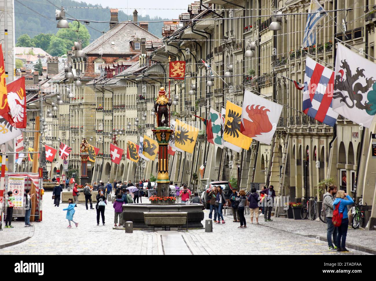 Bern, Switzerland - June 04, 2017: People in old city center of Bern. Shopping street in the old medieval city of Bern, Switzerland.er of Bern, Switze Stock Photo