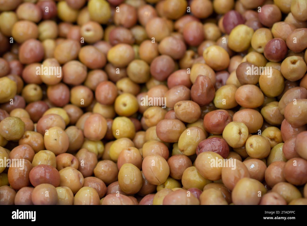 Green olives as health food preserved in olive oil Stock Photo Alamy