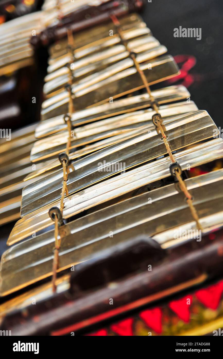 Gamelan is a traditional percussion musical instrument from Java, Indonesia made from brass plates lined up to form notes Stock Photo