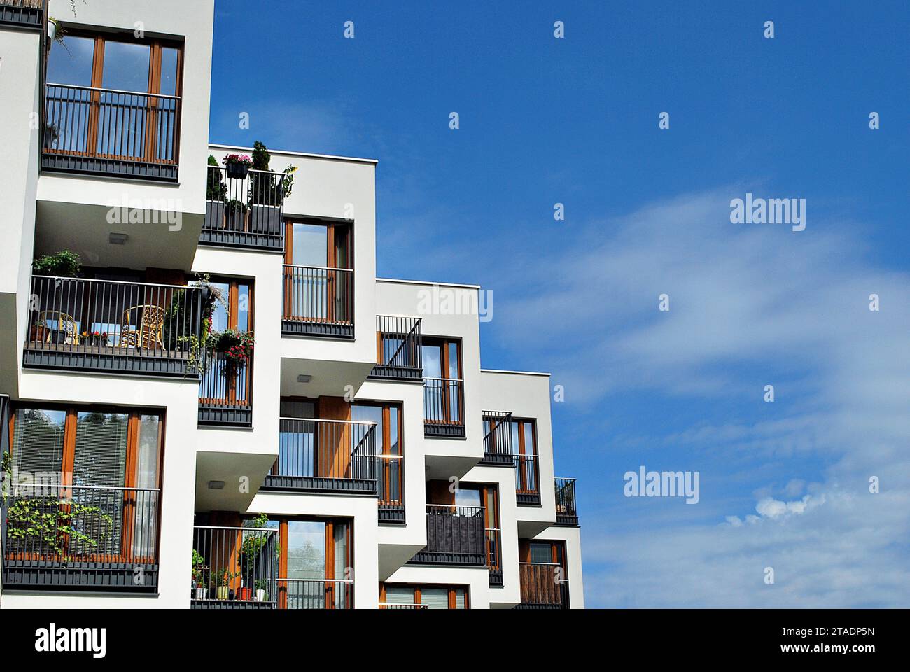 New apartment building with glass balconies. Modern architecture houses ...