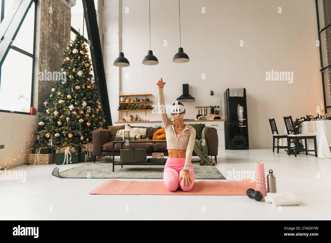 A delightful young woman engages in stretching exercises near a