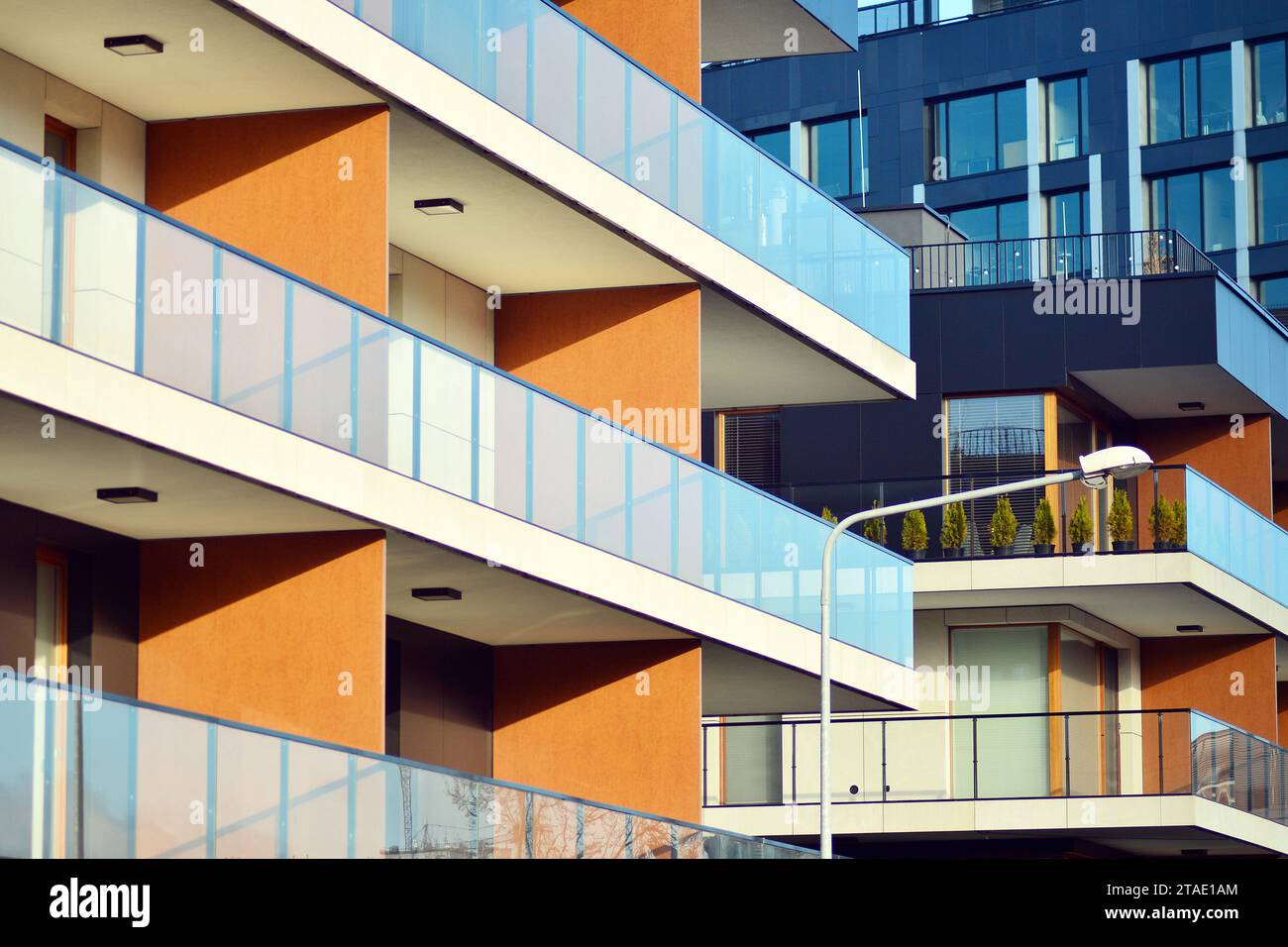New apartment building with glass balconies. Modern architecture houses ...