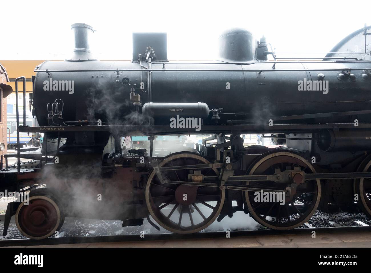Old Italian restored steam locomotive,park on the platform. Siena, Italy Stock Photo