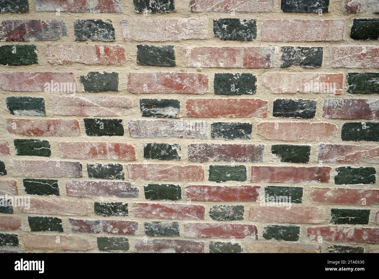 An old brick background showing texture and uniform lines. Stock Photo
