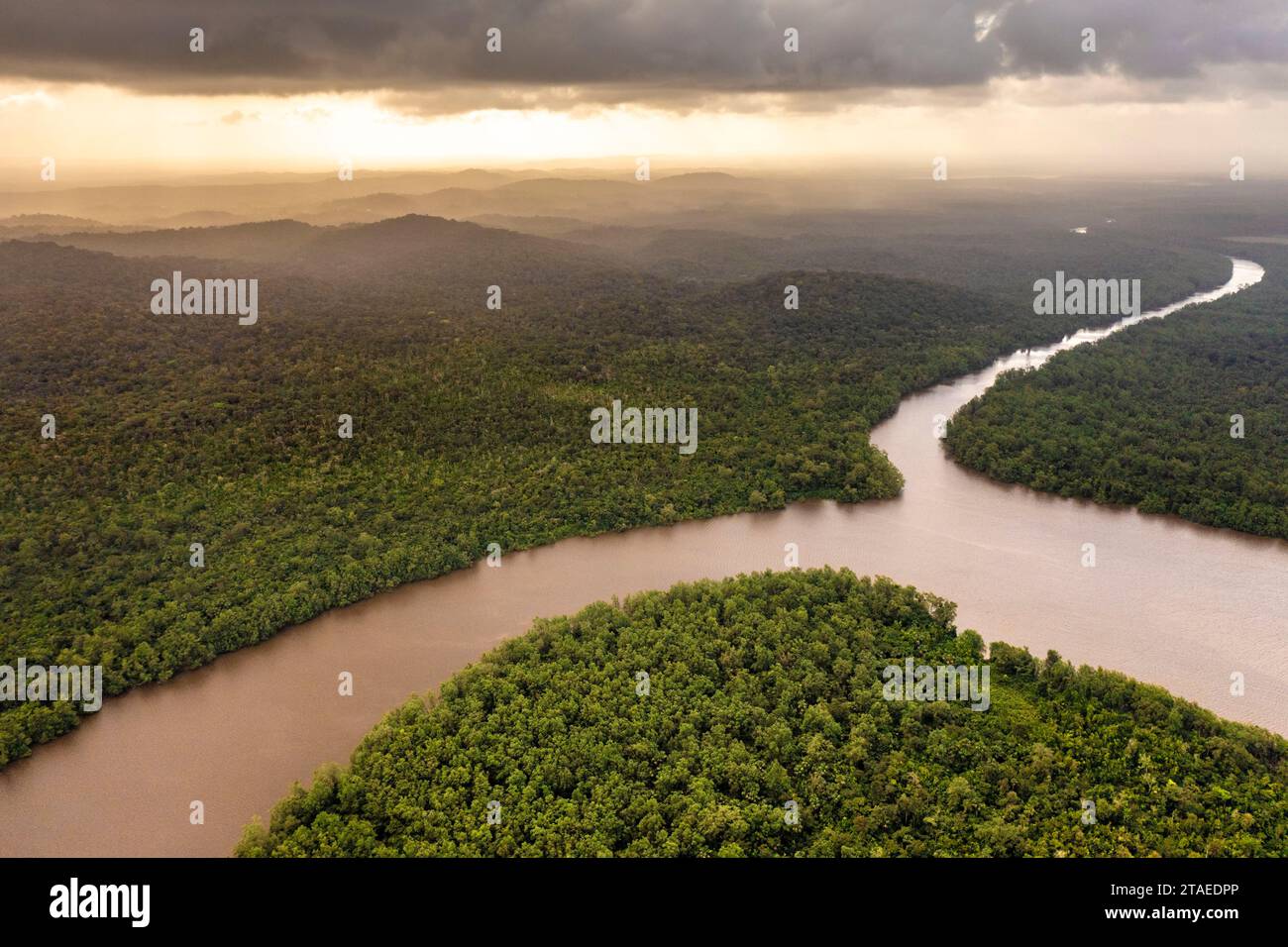 France, French Guiana, Roura, beautiful late afternoon in the wet season on the Oyack river, the Comté river in the background and the Amazon rainforest(aerial view) Stock Photo