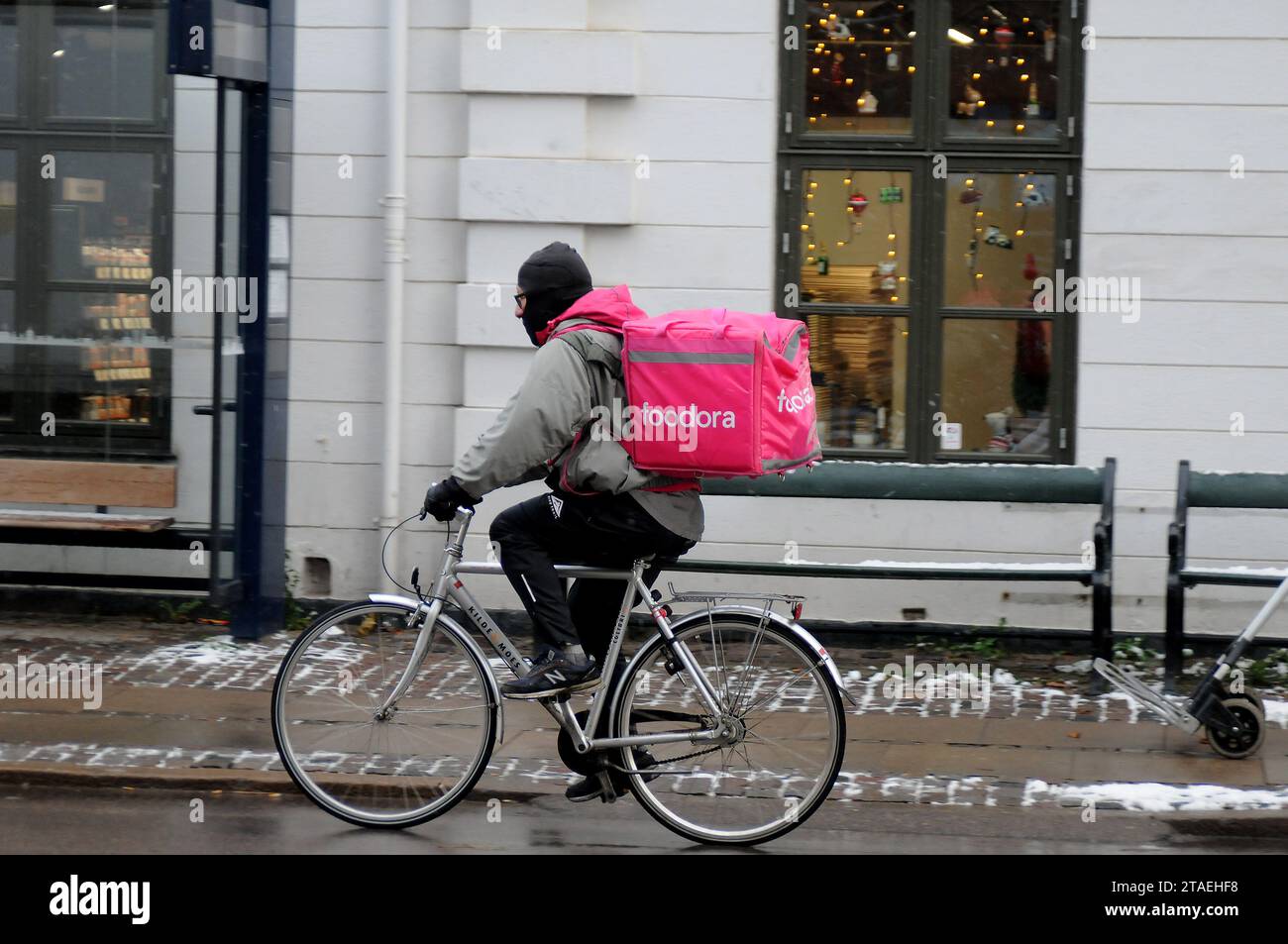 Copenhagen, Denmark /30 November 2023/. Foodora delivery biker and scooter  male in danish capital. (Photo.Francis Joseph Dean/Dean Pictures Stock  Photo - Alamy