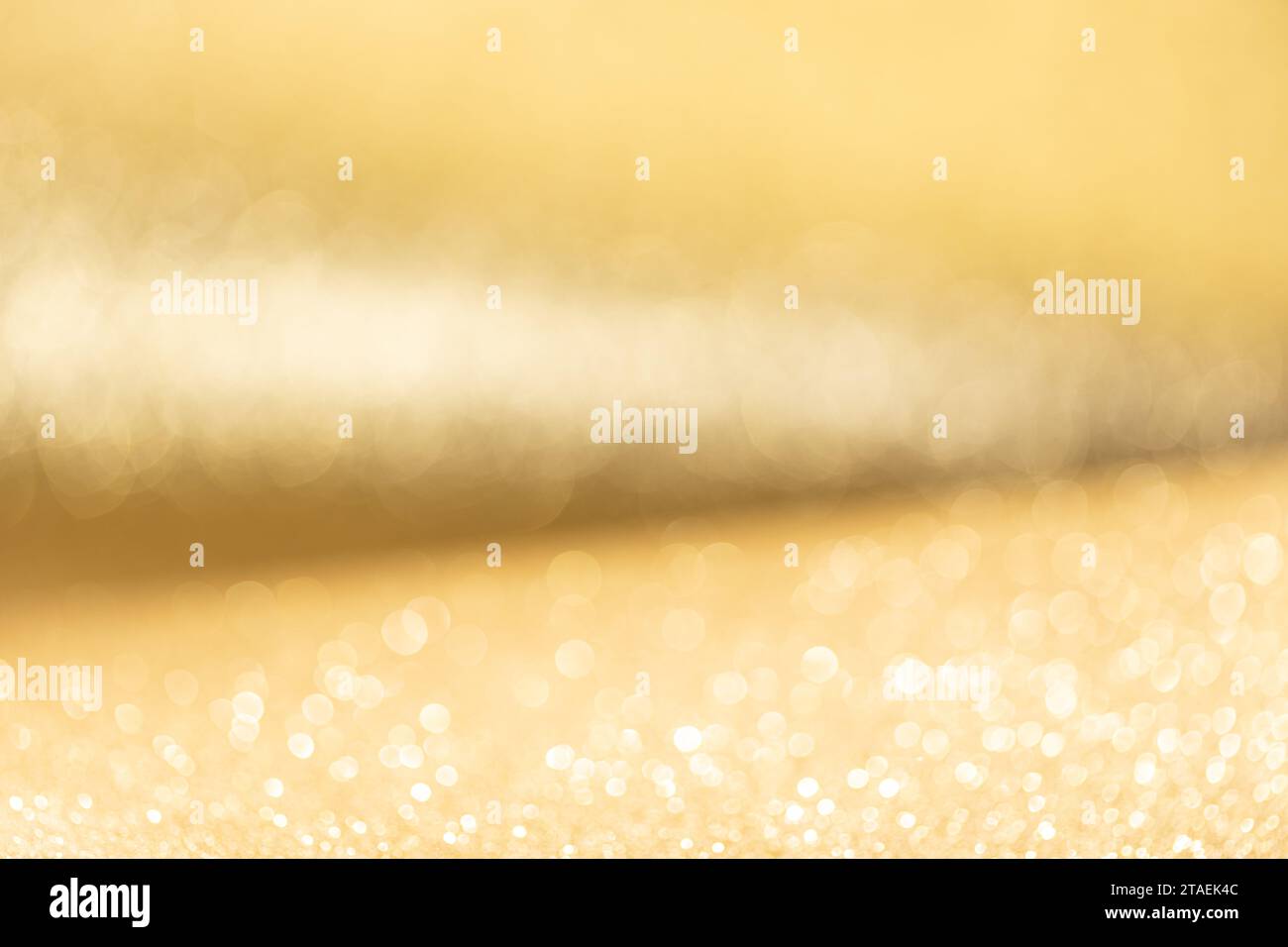 Blurry Golden Glitter Abstract Background. Full frame Stock Photo