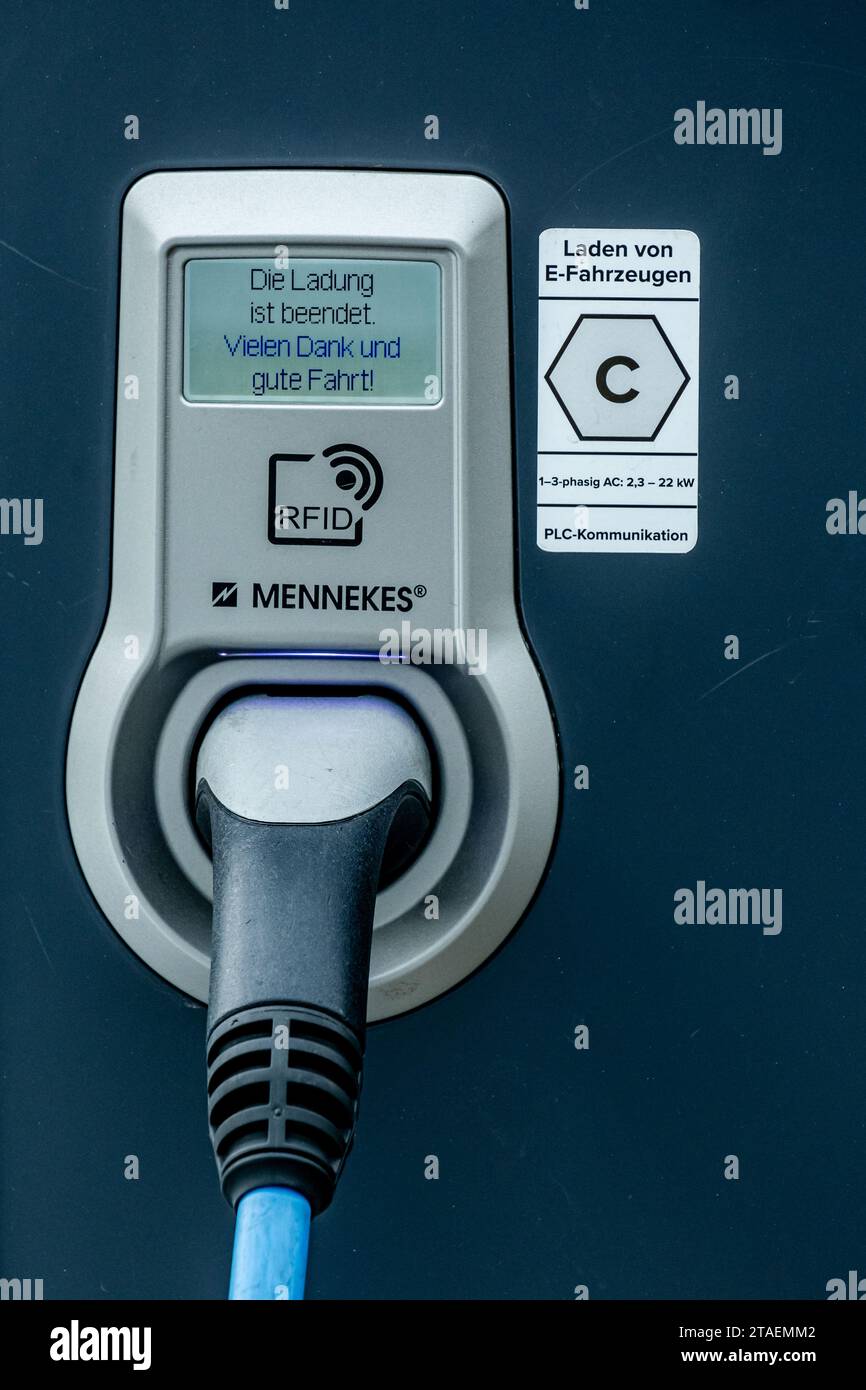 Hamburg, Germany - 05 15 2023: Close-up of the display and connection cable of an e-car charging station. Stock Photo