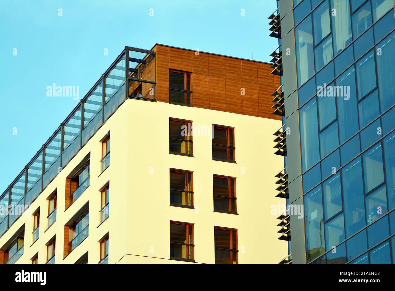 View of New apartment building with glass balconies. Modern architecture houses ...