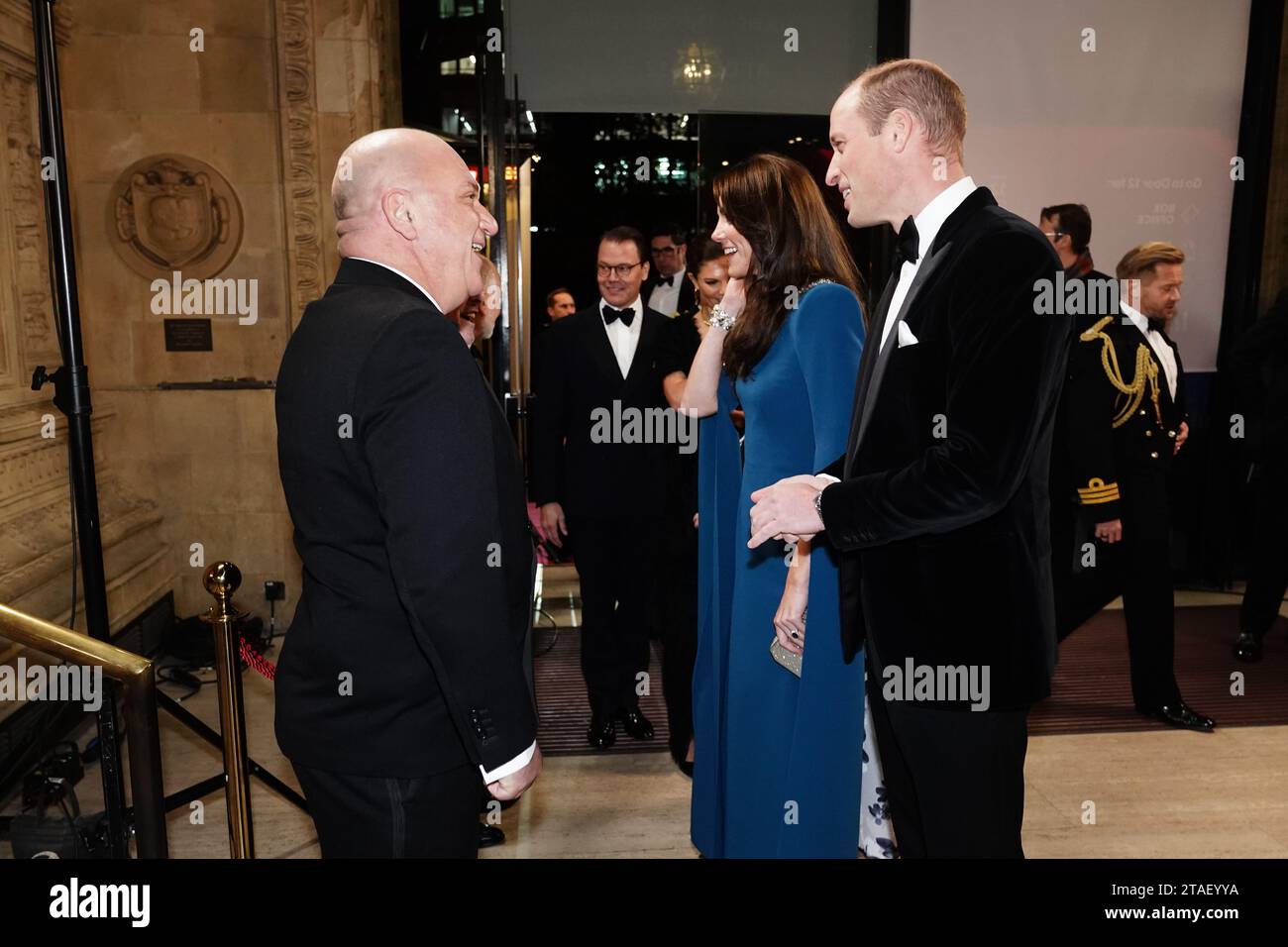 The Prince and Princess of Wales greet Giles Cooper, Chairman of the Royal Variety Charity, before the Royal Variety Performance at the Royal Albert Hall, London. Picture date: Thursday November 30, 2023. Stock Photo
