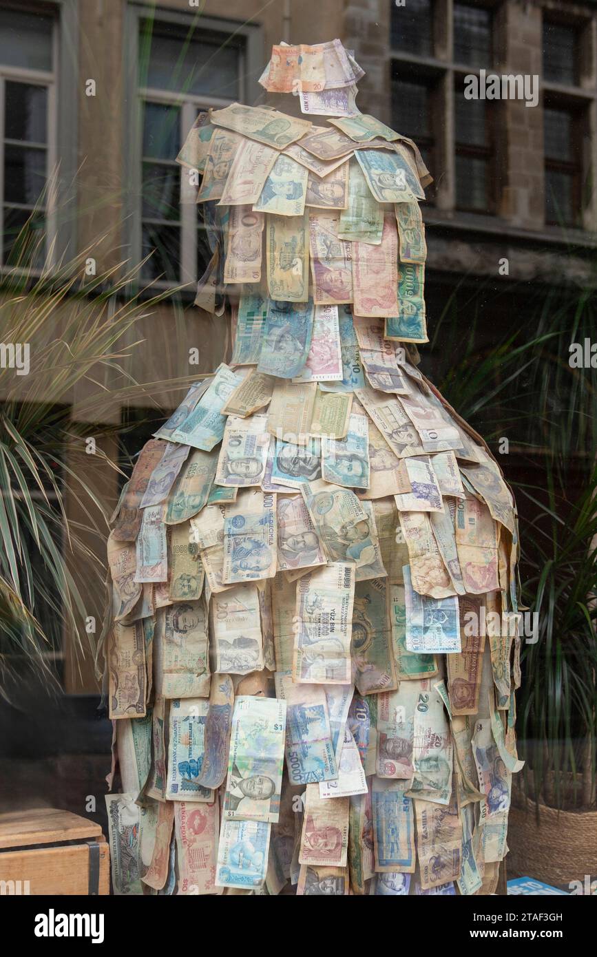Ghent, Belgium - July 25 2023: Women's dress designed from different country banknotes Stock Photo