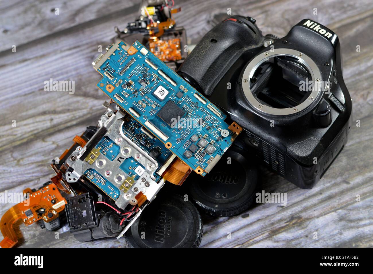 Cairo, Egypt, November 6 2023: DSLR photographic and video digital camera body interior repair by technician or engineer, camera and technology equipm Stock Photo