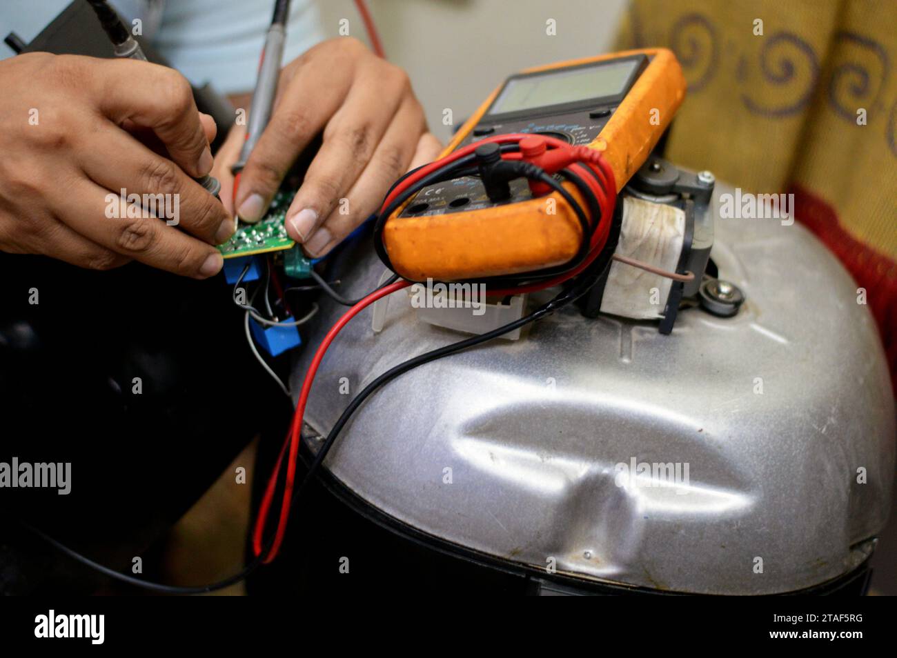 Cairo, Egypt, November 7 2023 an air fryer maintenance, repair, An air