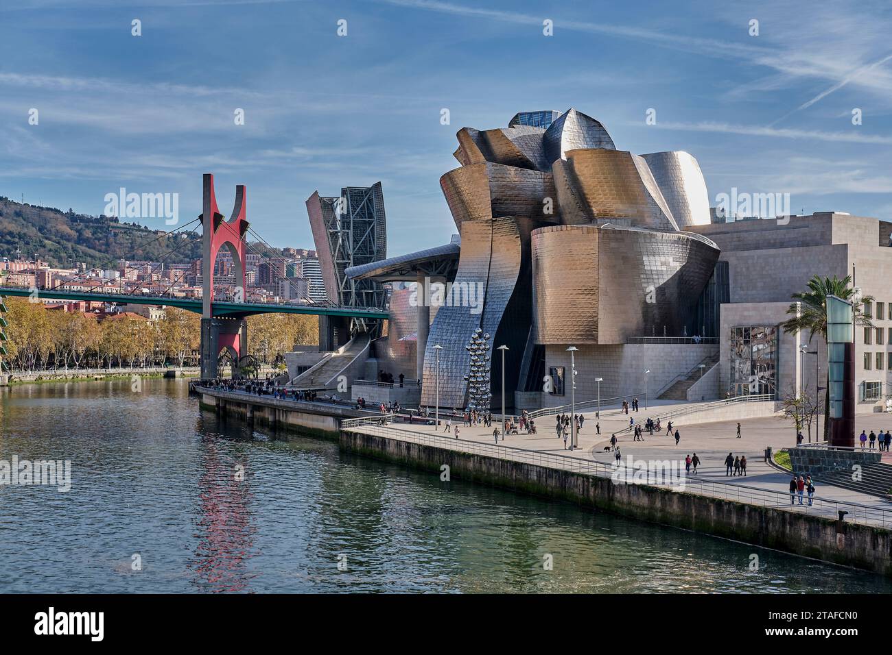 Guggenheim museum in Bilbao, Spain. panoramic view of a sunny day where we can see people walking around Stock Photo