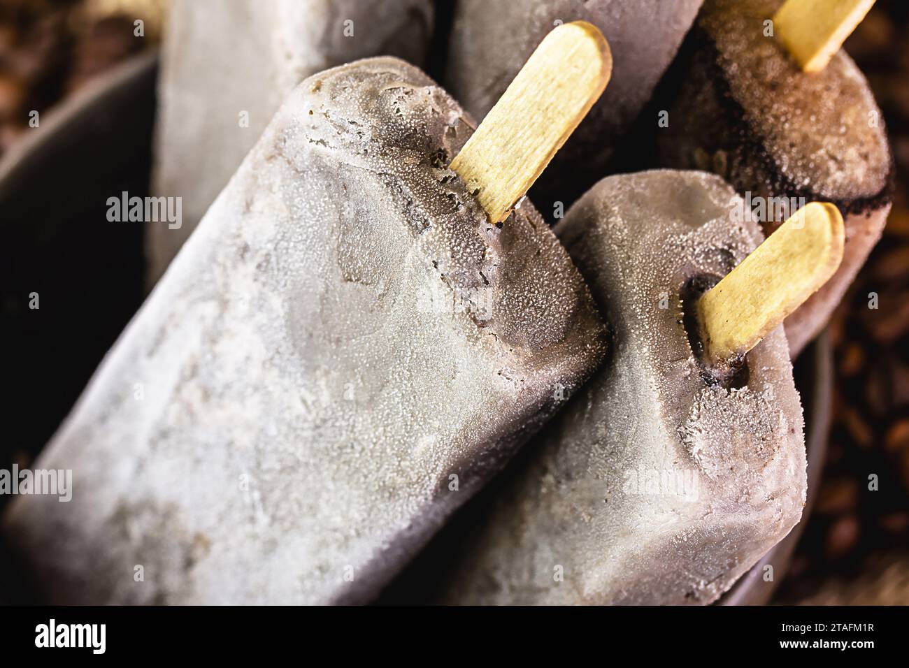 bowl with coffee flavored popsicles. Cold dessert, cappucino popsicle, pop ice Stock Photo
