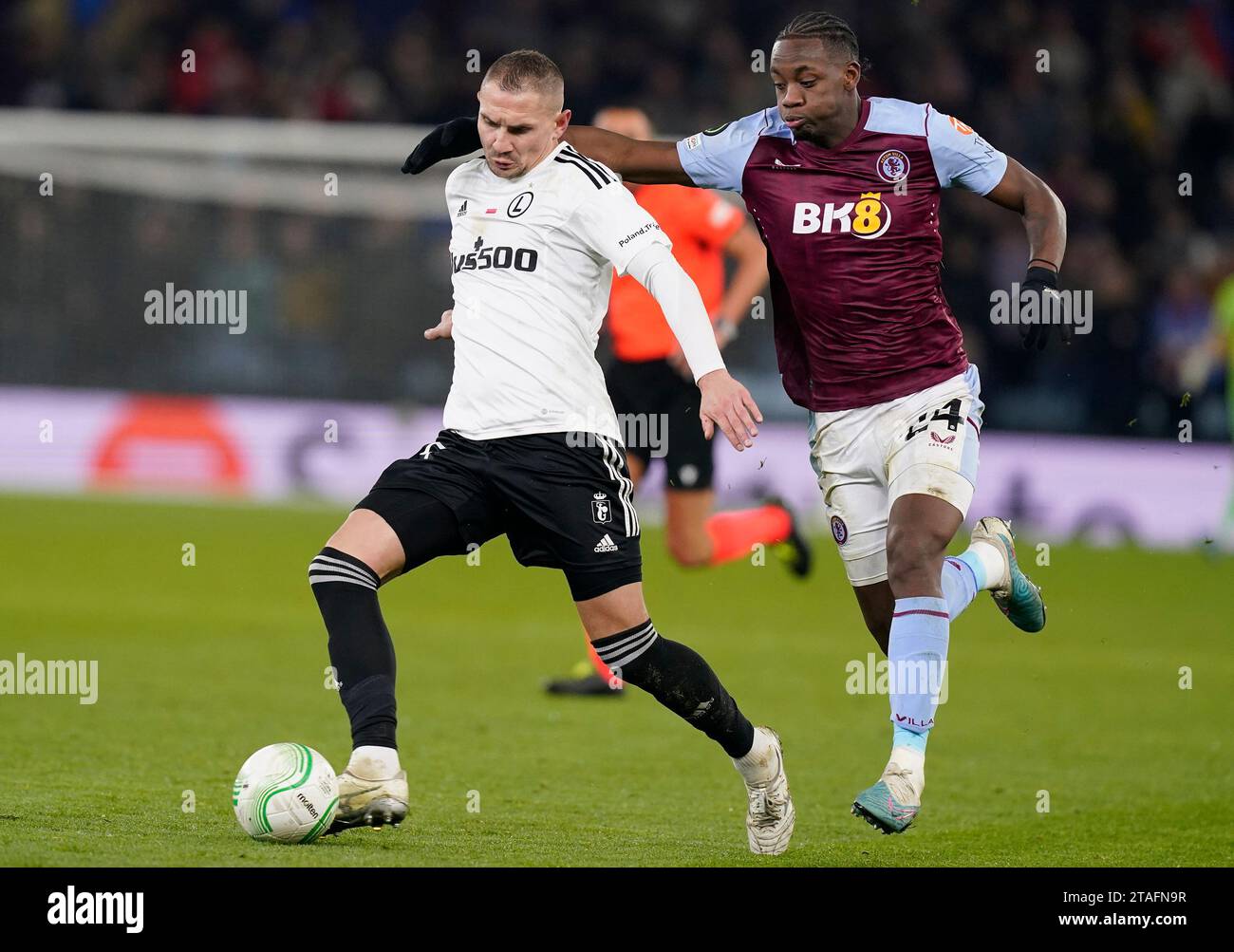 Birmingham, UK. 30th Nov, 2023. Artur Jędrzejczyk of Legia Warsaw (L) is challenged by Jhon Duran of Aston Villa during the UEFA Europa Conference League match at Villa Park, Birmingham. Picture credit should read: Andrew Yates/Sportimage Credit: Sportimage Ltd/Alamy Live News Stock Photo