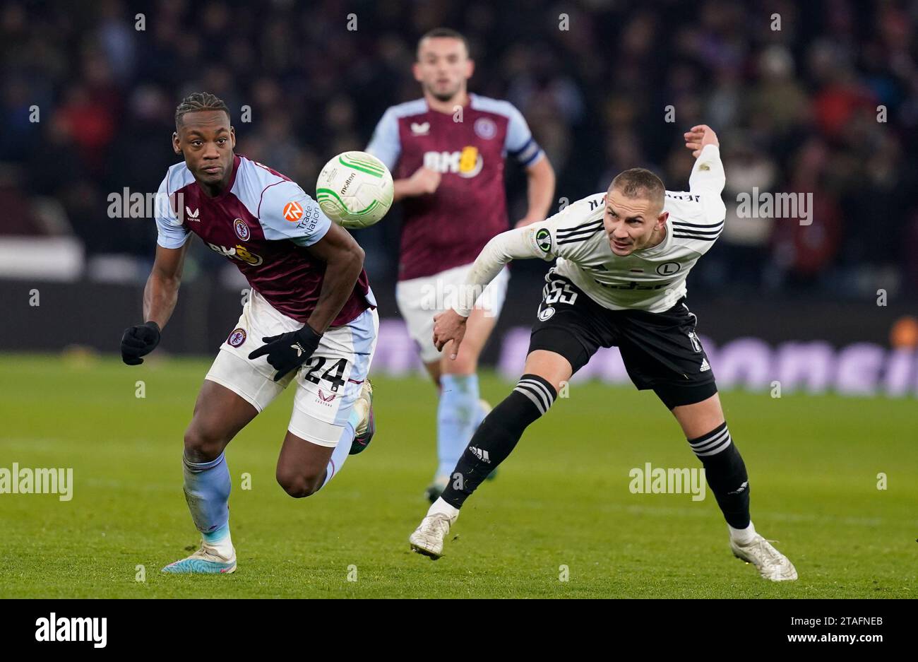 Birmingham, UK. 30th Nov, 2023. Jhon Duran of Aston Villa (L) is challenged by Artur Jędrzejczyk of Legia Warsaw during the UEFA Europa Conference League match at Villa Park, Birmingham. Picture credit should read: Andrew Yates/Sportimage Credit: Sportimage Ltd/Alamy Live News Stock Photo