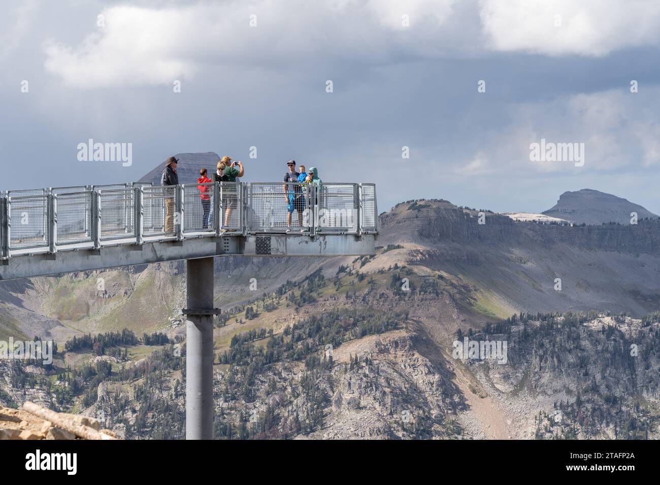 September 13, 2023: Jackson Hole, Wyoming: Tourist enjoy the view from the Grand Teton Skywalk and Viewing Platform on top of Rendezvous Mountain. Stock Photo