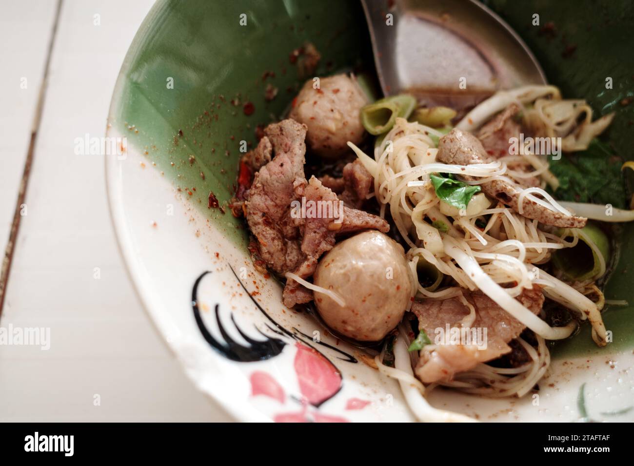 Thai style noodle soup. Thai Boat noodle soup, with beef, meat ball and bean sprout. Stock Photo