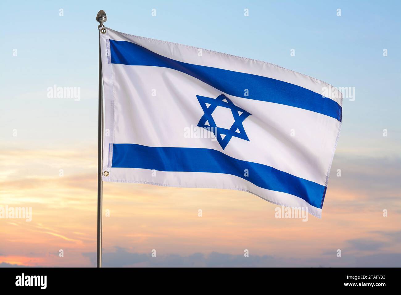 National flag of Israel against blue sky with clouds Stock Photo - Alamy