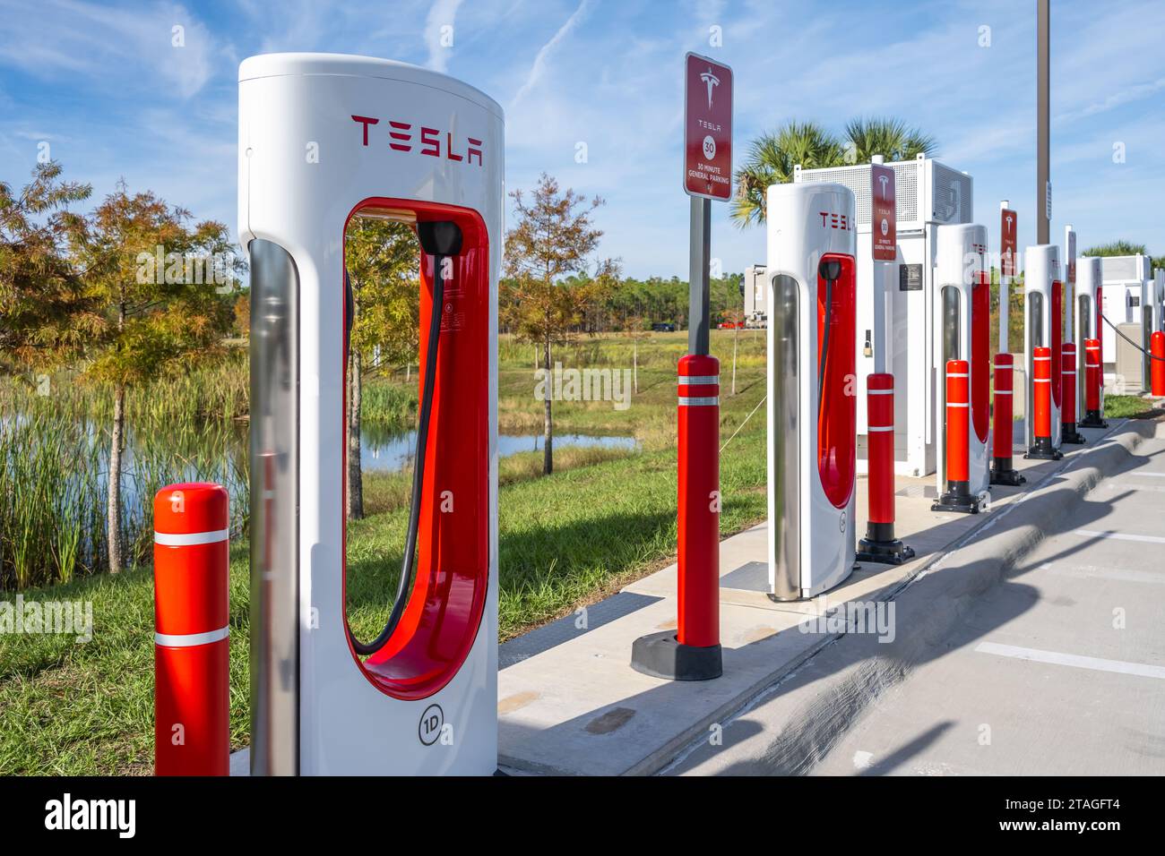 Tesla EV Superchargers at the Buc-ees travel center fueling station along I-95 in Daytona Beach, Florida. (USA) Stock Photo