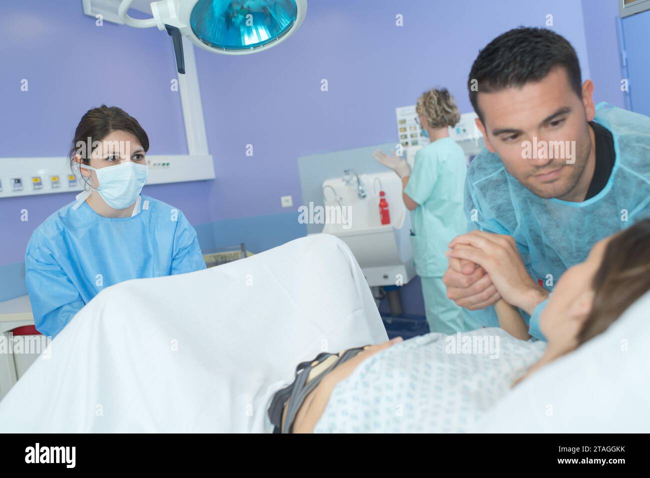 woman in process of giving birth Stock Photo Alamy