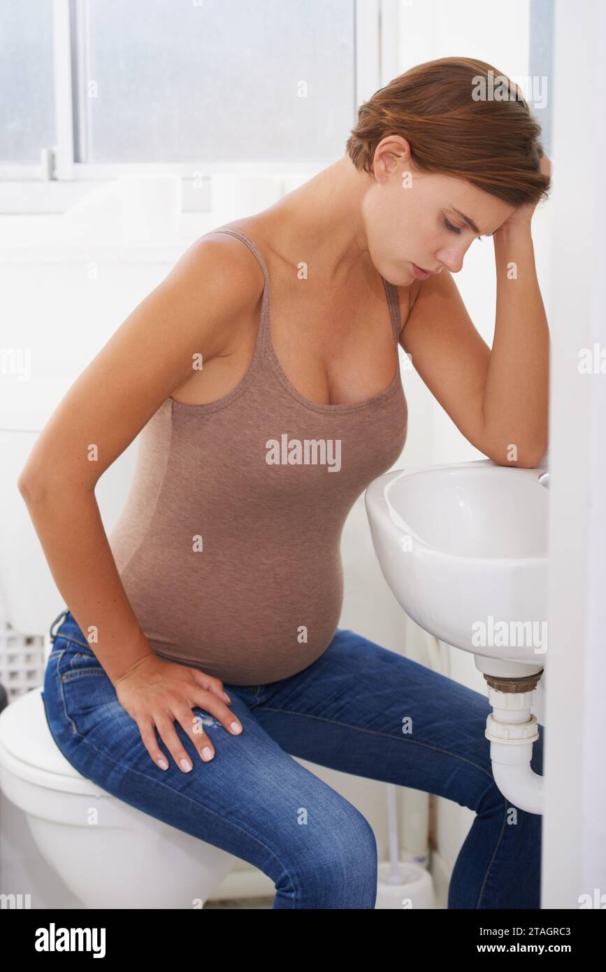 Vomiting, pregnant woman and morning sickness in bathroom, nausea and